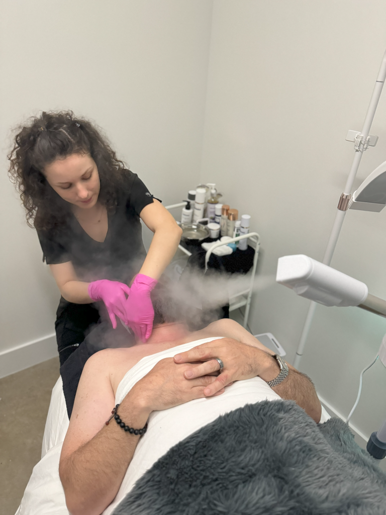 Amber Ciociano giving a patient a treatment.