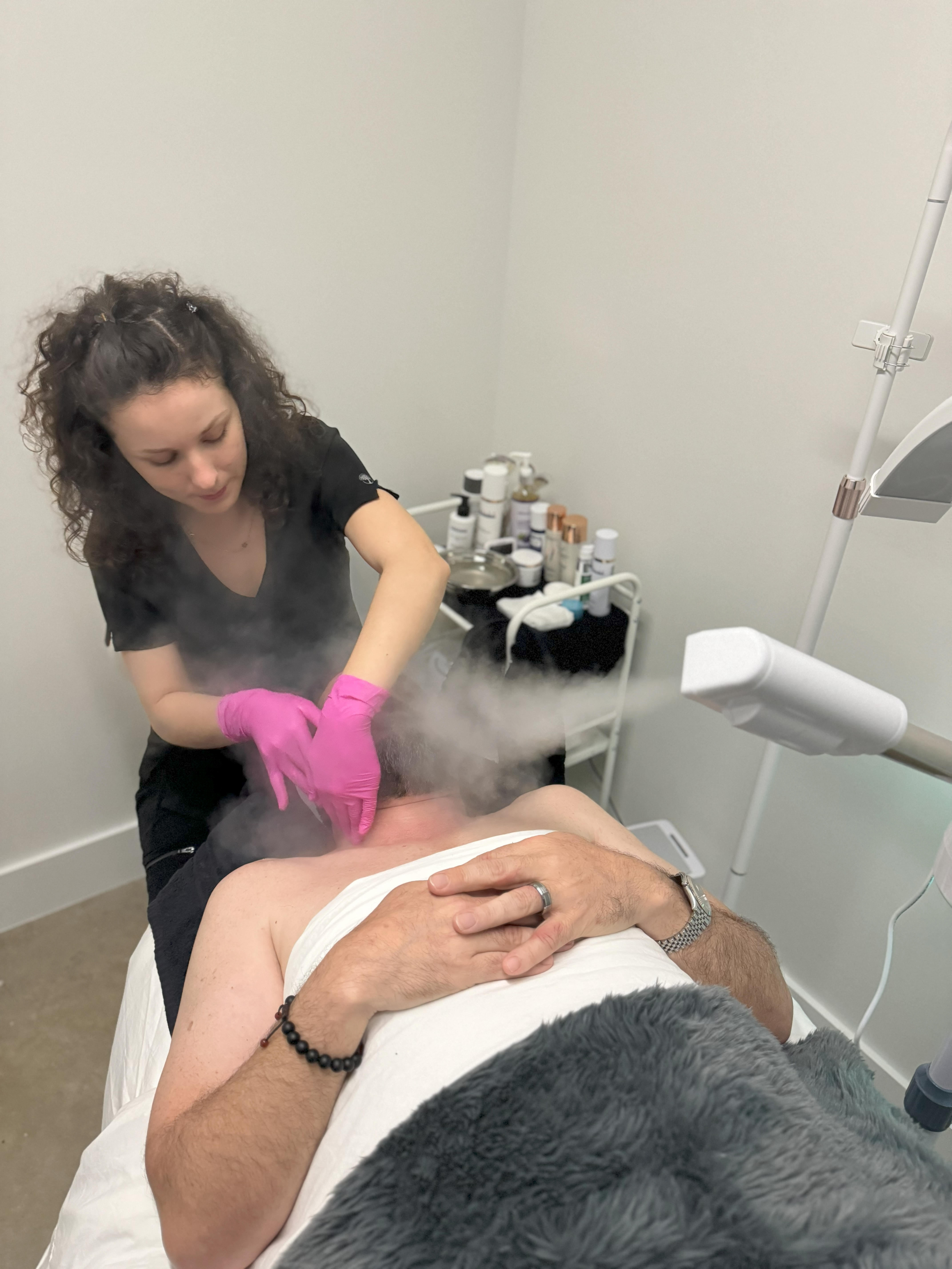 Amber Ciociano giving a patient a treatment.